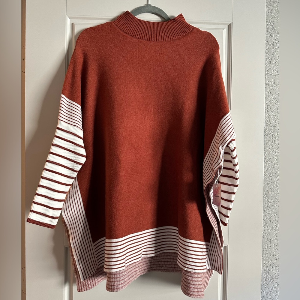 Never been worn, new with tags, throw sweater!